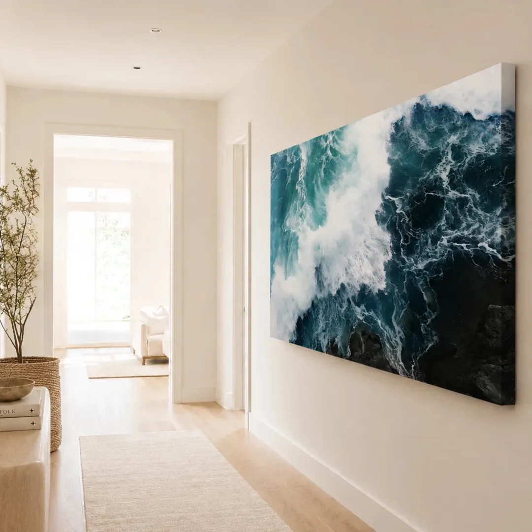 Large Giant Art ocean wave canvas hanging in a bright hallway